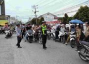 Sat Lantas Polres Tanjungbalai Amankan Arus Lalu Lintas Pulang Sekolah di Jalan Sudirman
