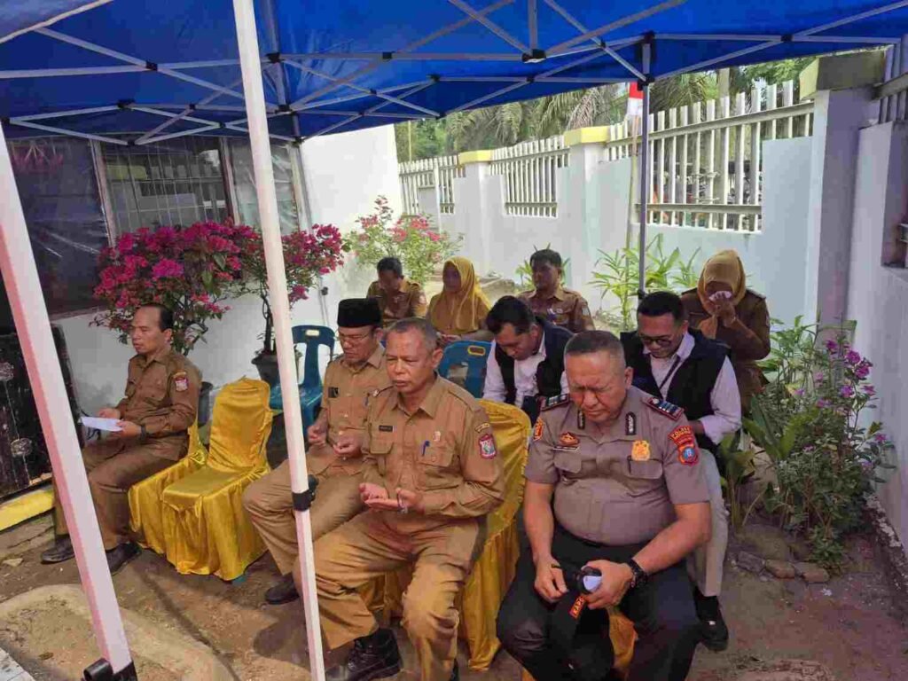 Wakapolres Tanjungbalai Hadiri Penyerahan Bantuan Pangan Beras di Teluk Nibung