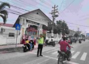 Personel Sat Lantas Polres Tanjung Balai Lakukan Pengamanan Jalur Pulang Sekolah, Pastikan Keselamatan Para Siswa